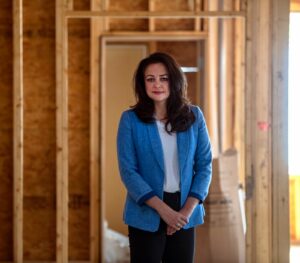 Katelyn Roberts standing in the construction of Sanctum 1.5