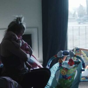 Mother holding baby at 2nd Steps Housing